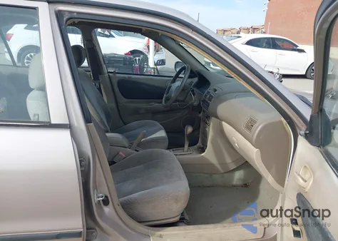 2000 Toyota Corolla Ce из США, поврежденный, VIN 1NXBR12EXYZ337319